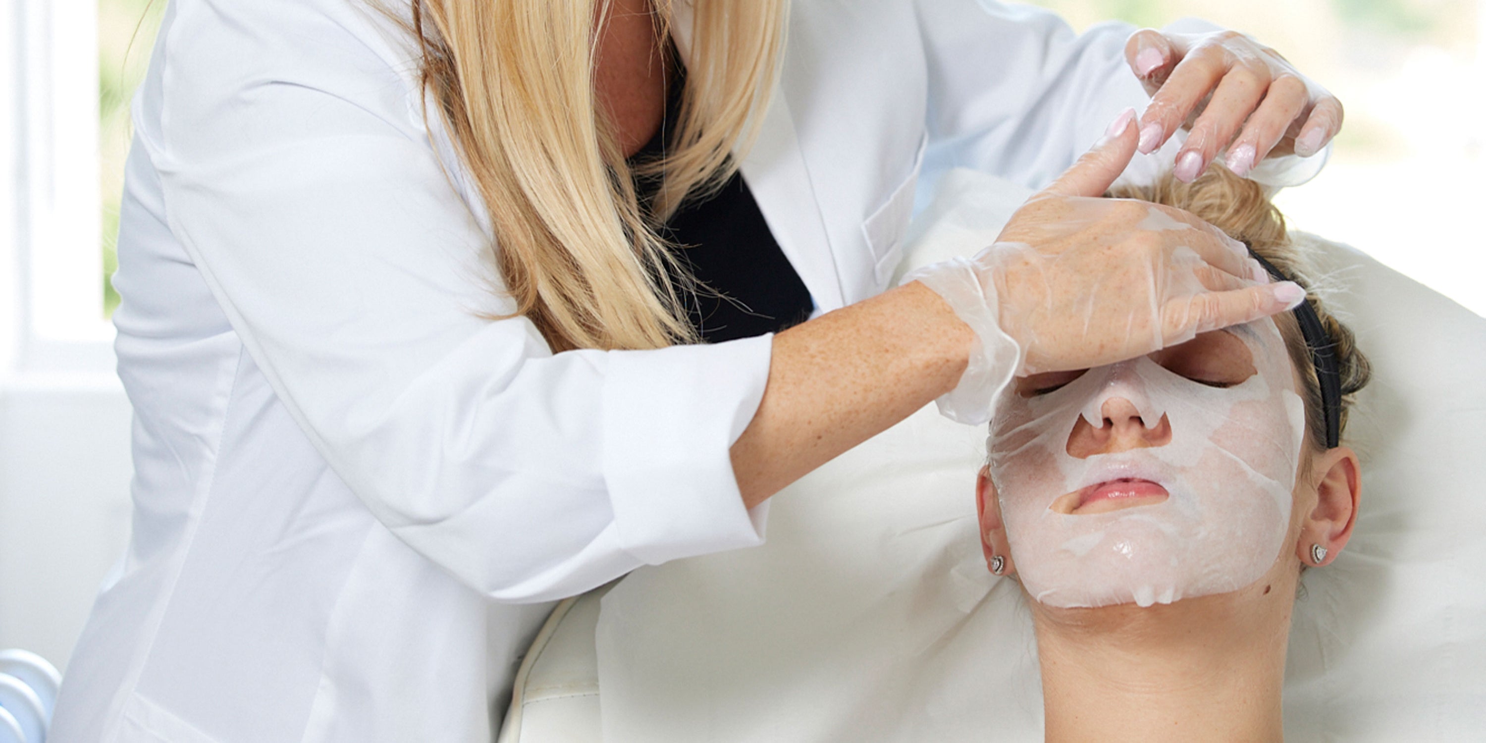 Dr Johanna Ward placing facial mask